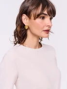 Beige dress with pearls at the collar