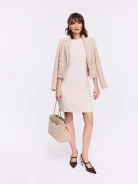 Beige dress with pearls at the collar