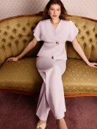 An elegant jacket with a decorative fastening