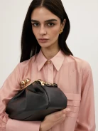 A small leather handbag in a dark chocolate shade