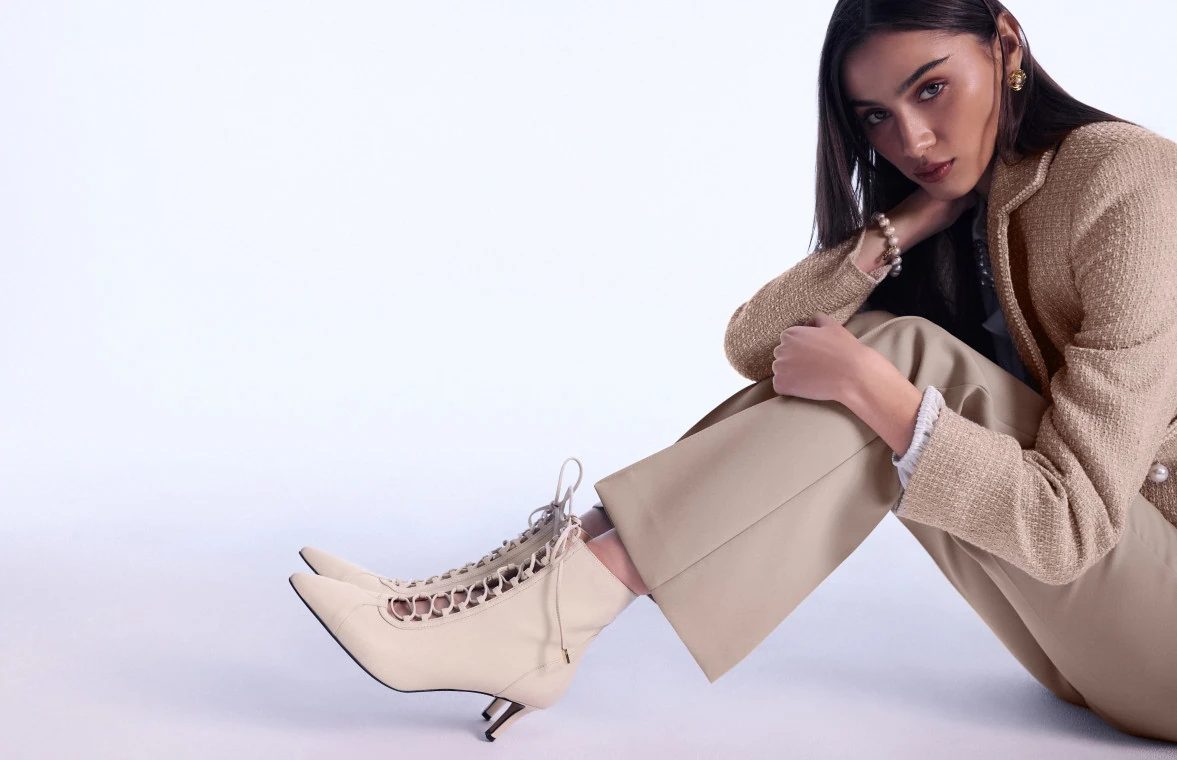 Beige heeled ankle boots made of genuine leather