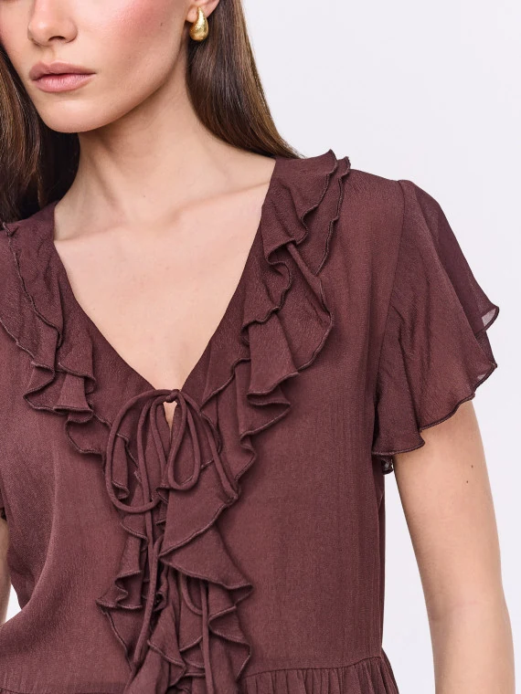 Chocolate-colored short-sleeved blouse with frills