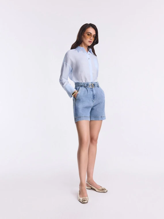 Light-colored high-waisted denim shorts