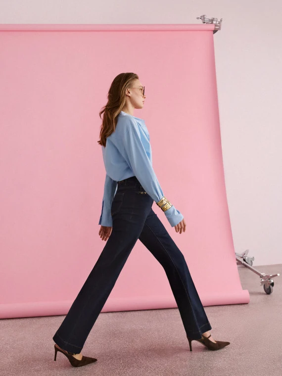 Navy blue straight jeans with decorative pockets