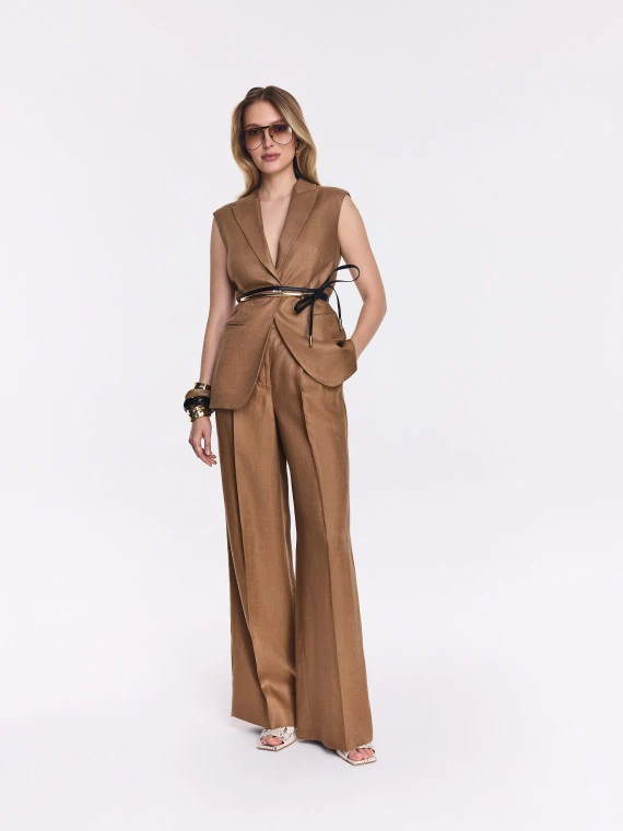 Caramel-colored high-waisted linen pants