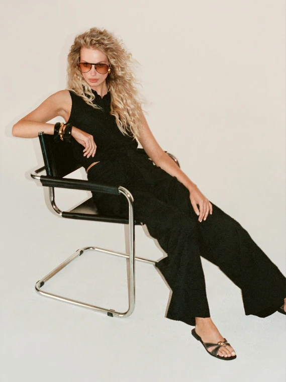Black wide-leg pants with floral embroidery