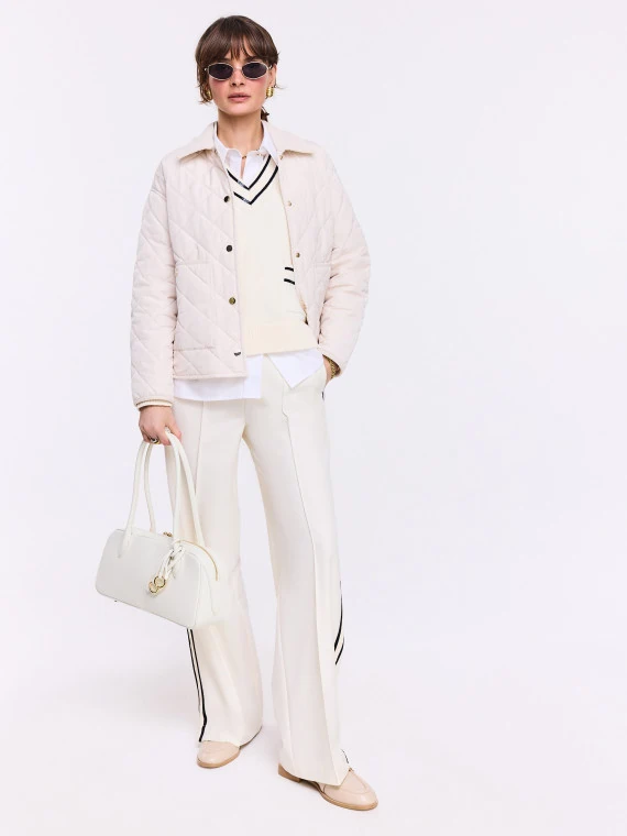 Cream pants with black piping