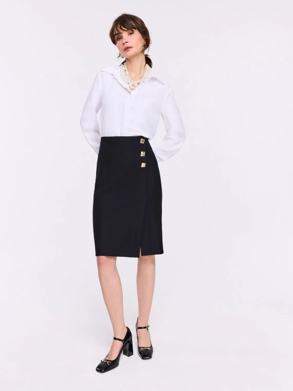 Black high-waisted skirt with decorative buttons