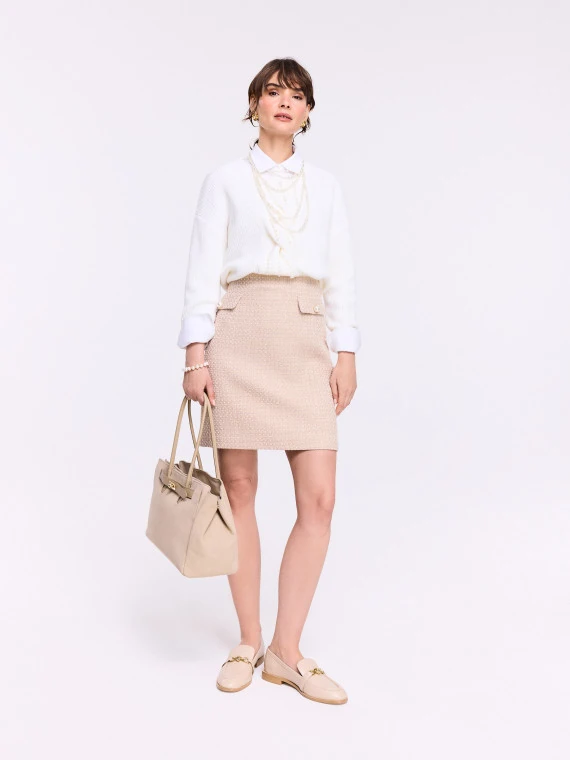 Cream ribbed sweater with braided weave