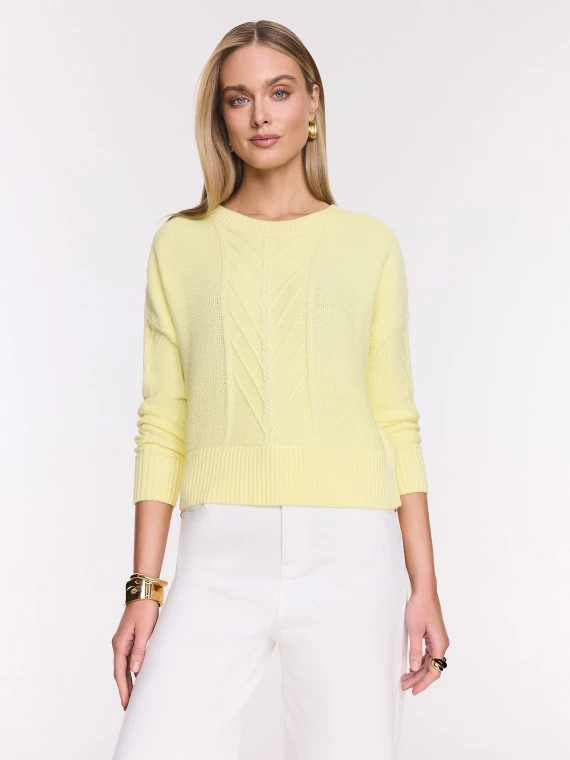 Light yellow cotton sweater with cable knit pattern