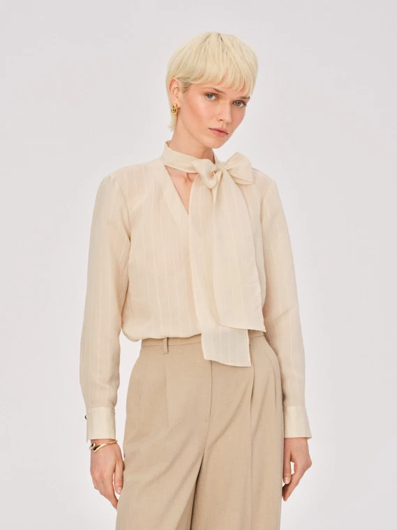 Cream striped blouse with a tie at the neck