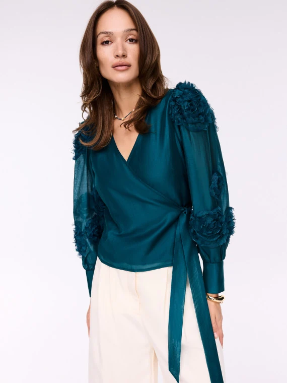 Dark green elegant blouse with decorative flowers