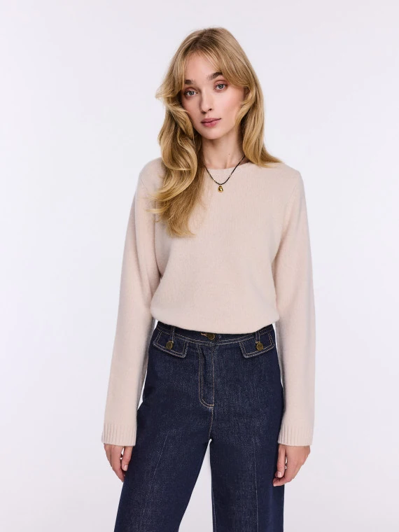 Beige wool sweater with a simple cut