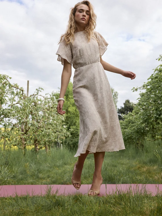 Beige midi dress with a jacquard pattern