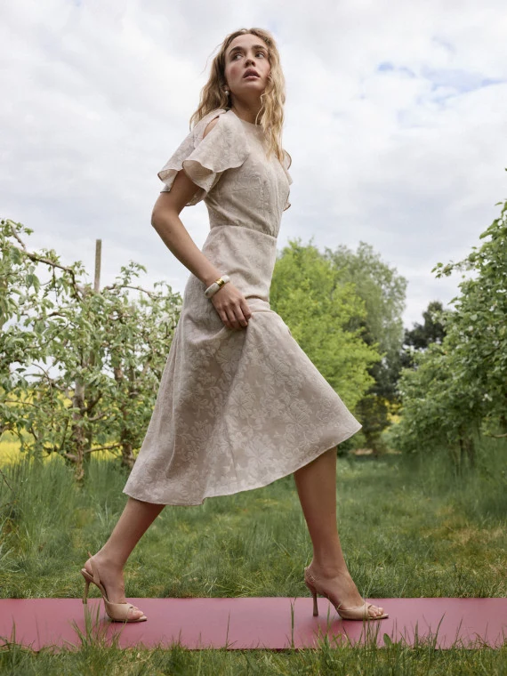 Beige midi dress with a jacquard pattern