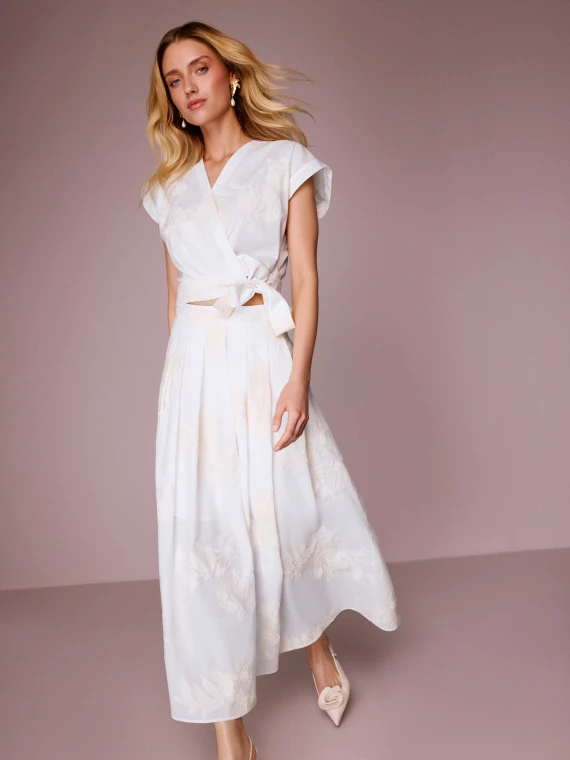 High-waisted cream-colored embroidered skirt