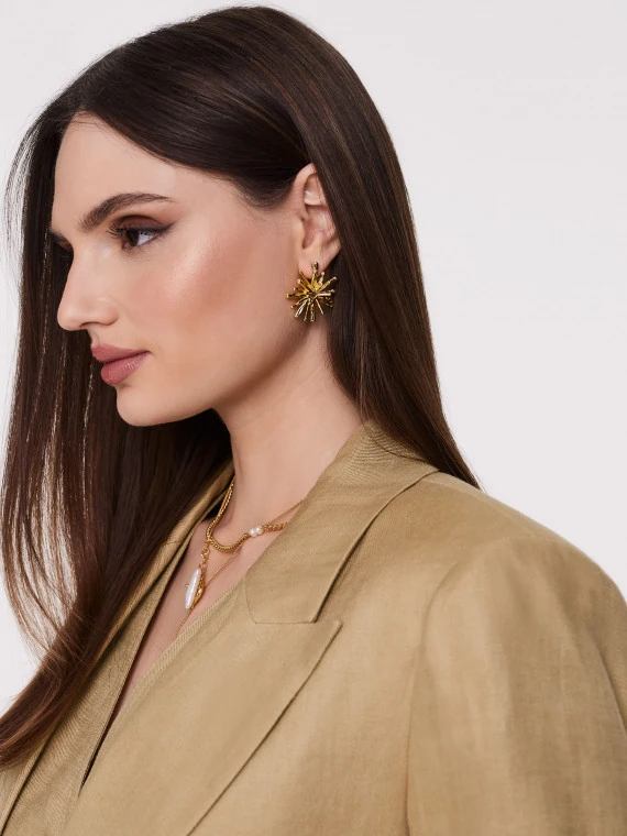 Earrings in the shape of sun