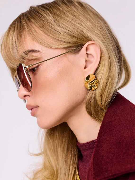Gold-plated earrings with an irregular shape