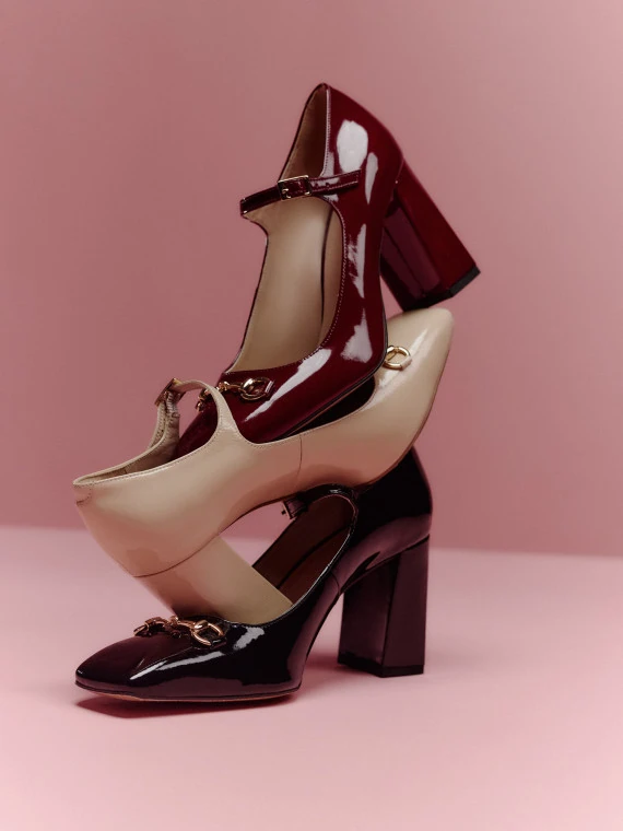 Burgundy patent leather pumps