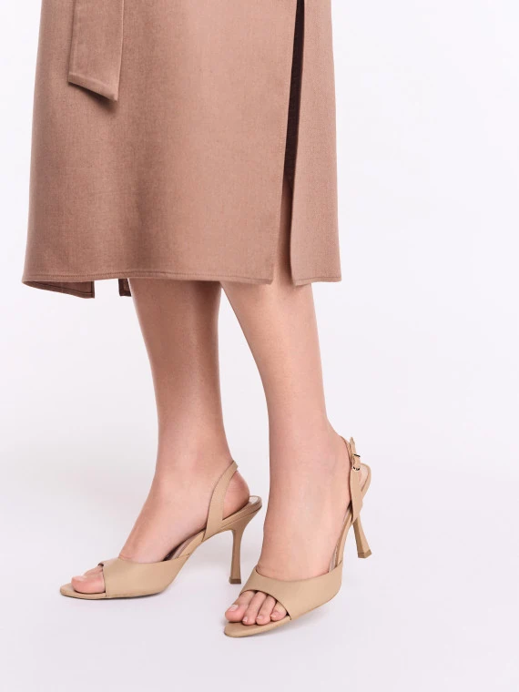 Beige open-heel pumps