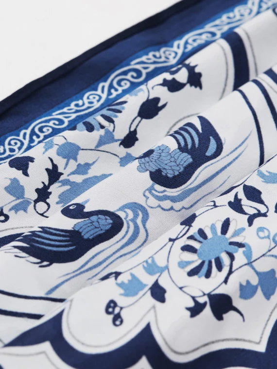 A silk scarf with blue patterns