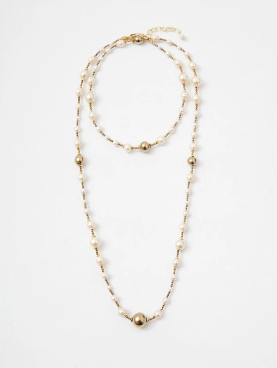 Long necklace made of natural pearls and hematite