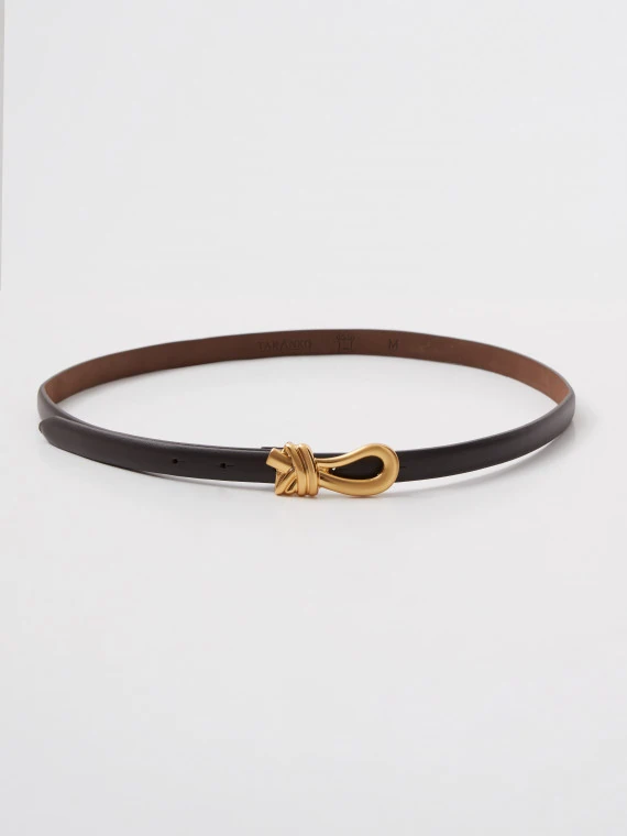 Leather belt with a decorative buckle