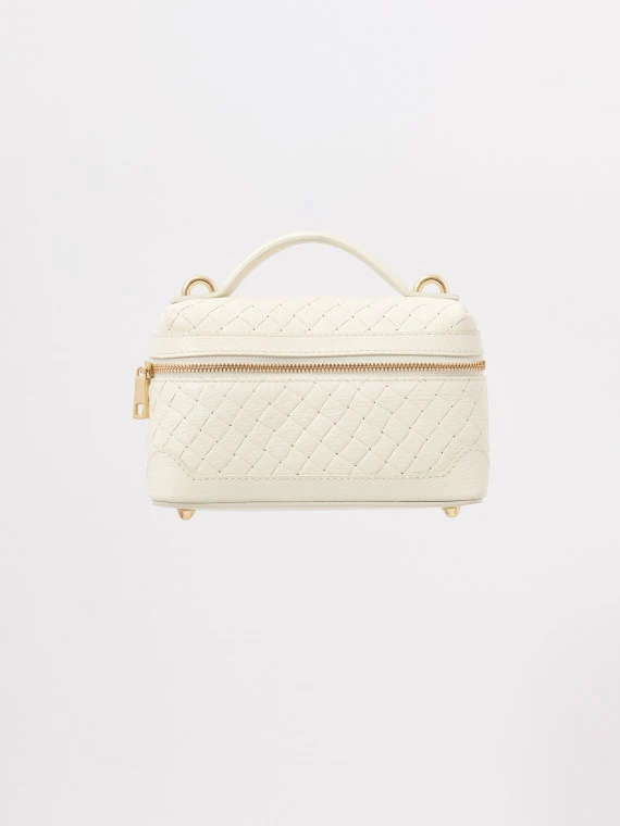 Cream-colored quilted satchel