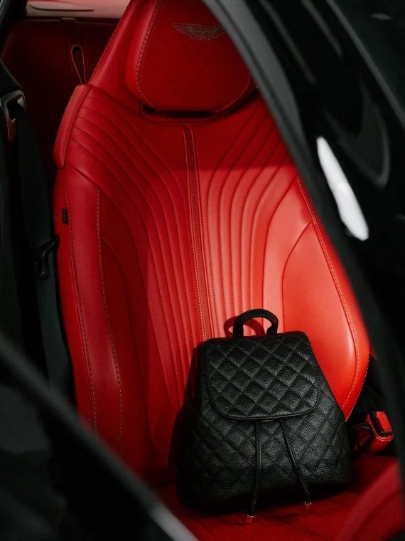 Black quilted leather backpack