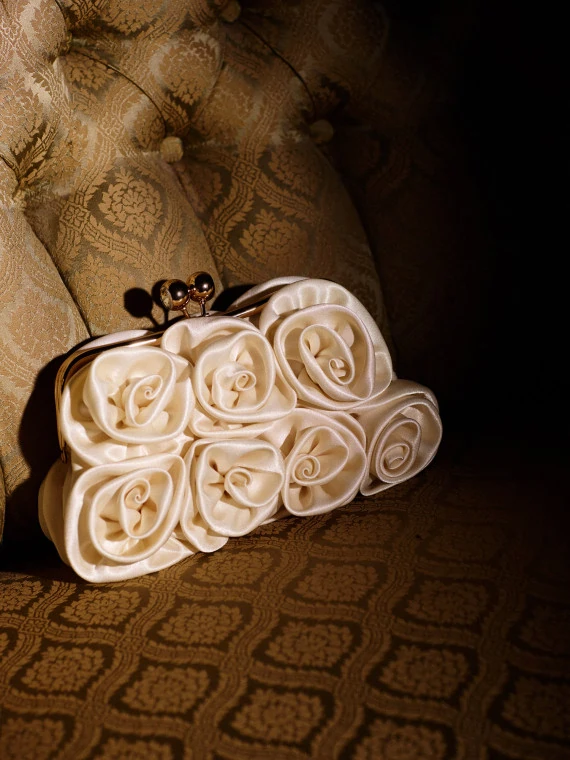 Cream-colored floral clutch