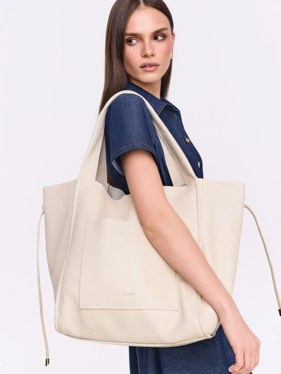 Large cream-colored leather bag