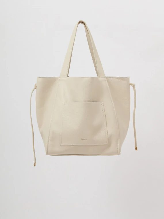 Large cream-colored leather bag