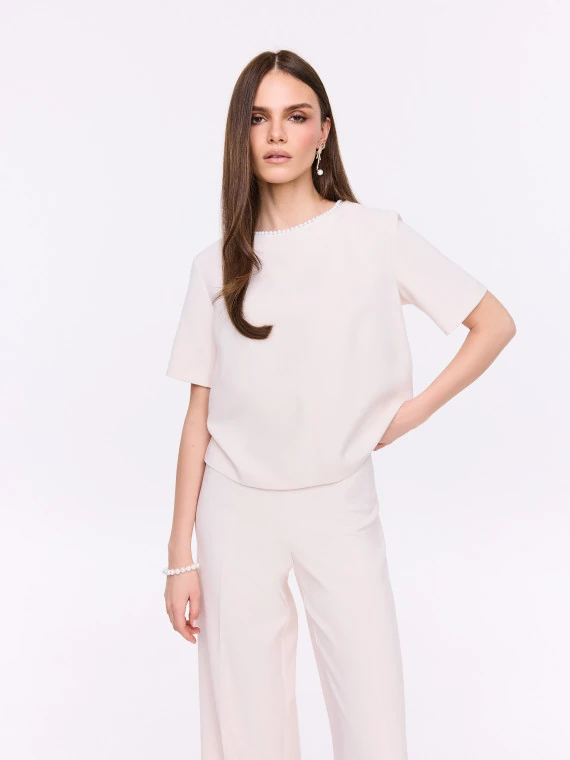Beige boxy blouse with pearl collar