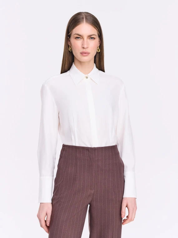 Classic white shirt with jeweled button