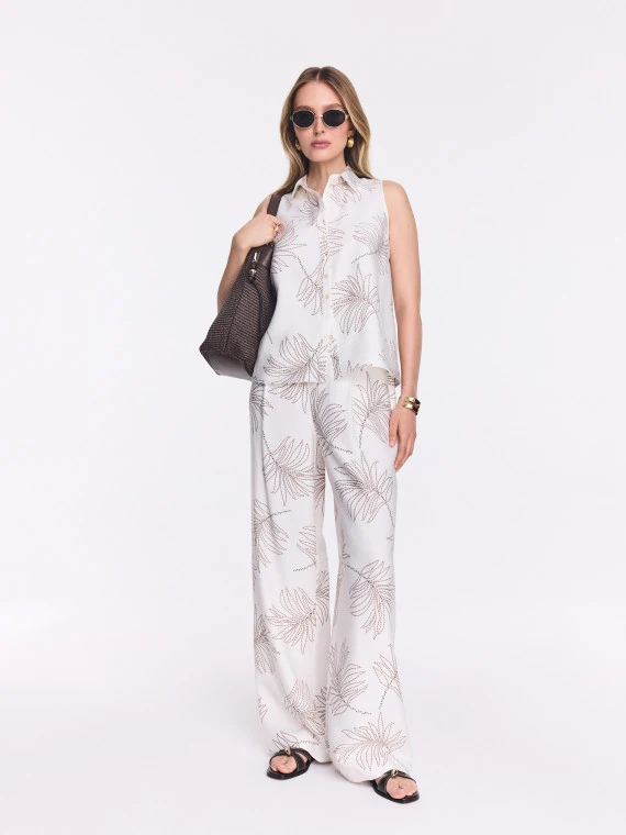 White wide-leg pants with a floral print