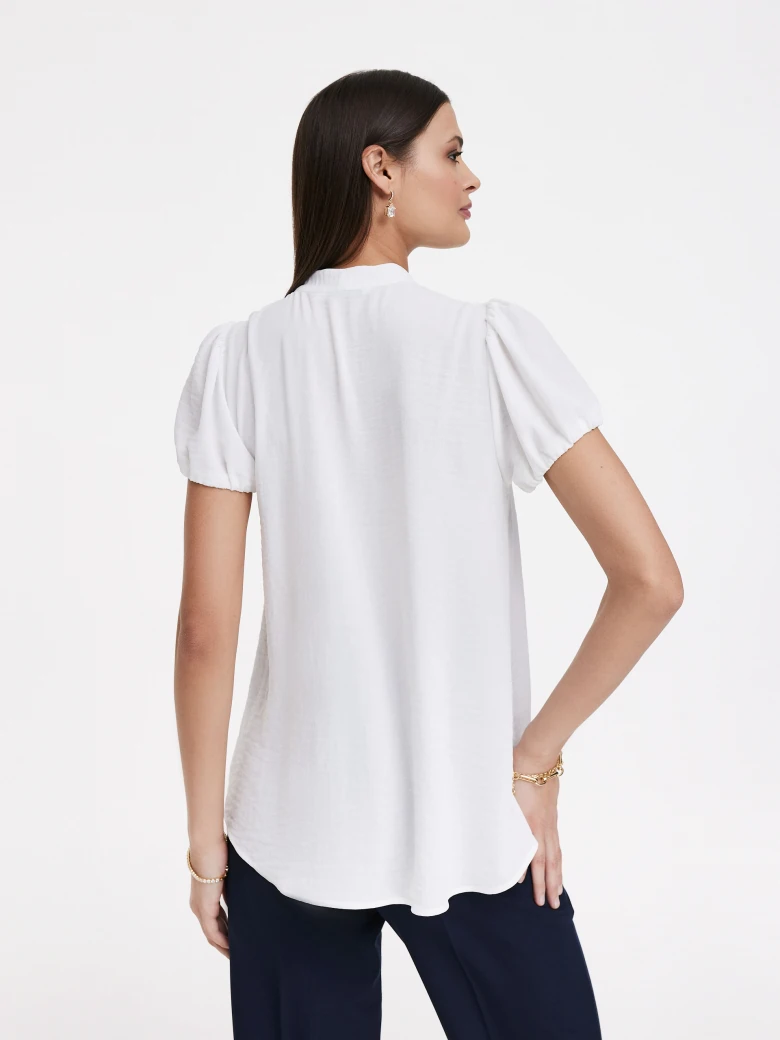 White shirt with bow and short sleeves