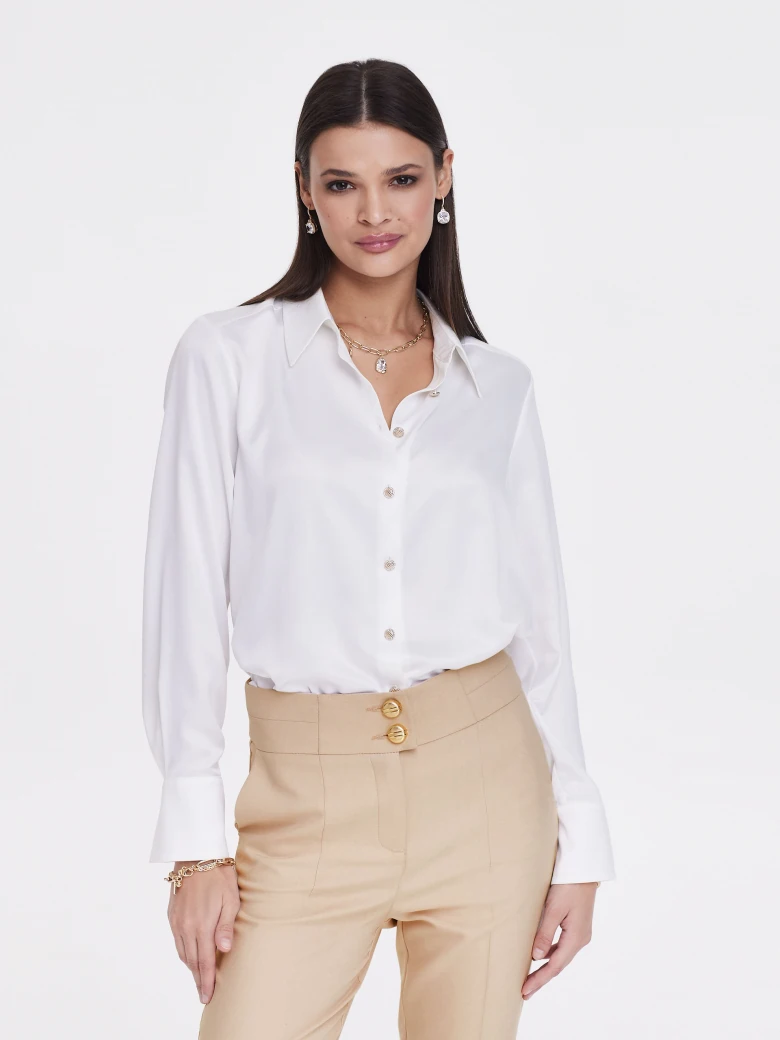 Beige cigarette pants with gold buttons