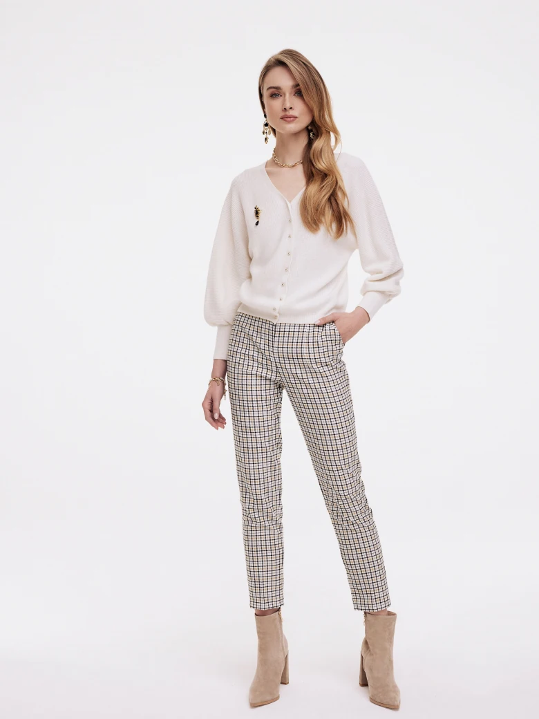 Cigarettes above the ankle in checkered pattern