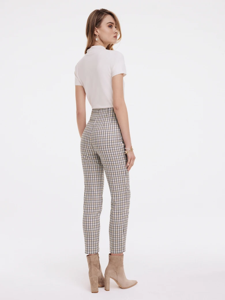 Cigarettes above the ankle in checkered pattern