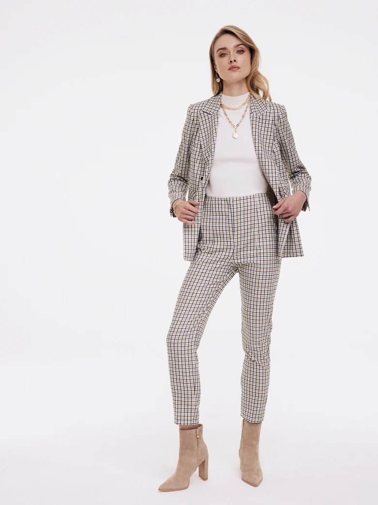 Cigarettes above the ankle in checkered pattern