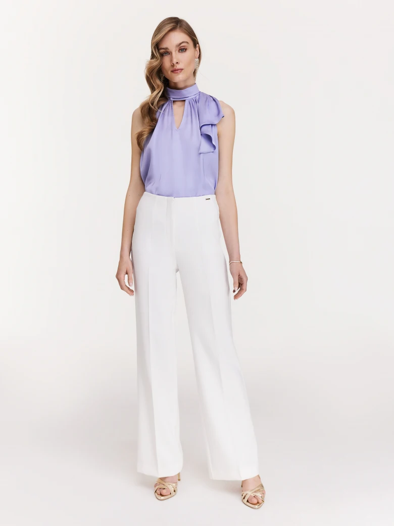 Elegant white pants with flared legs