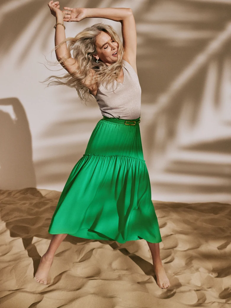 Green flared skirt with ruffles