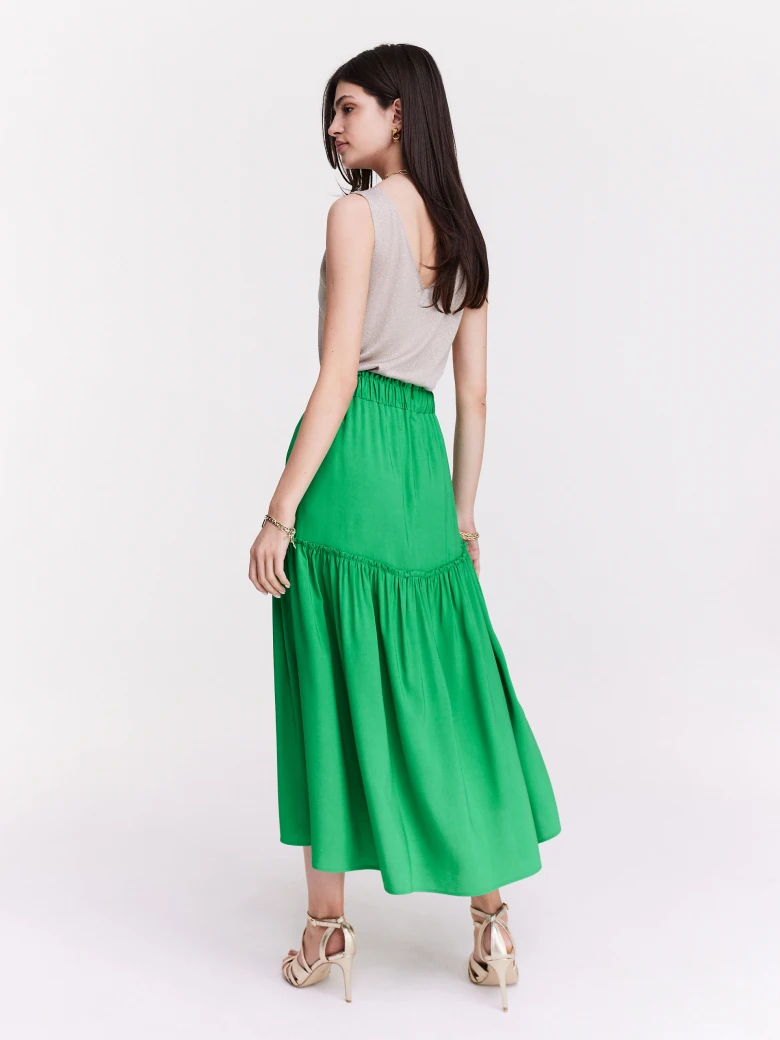 Green flared skirt with ruffles