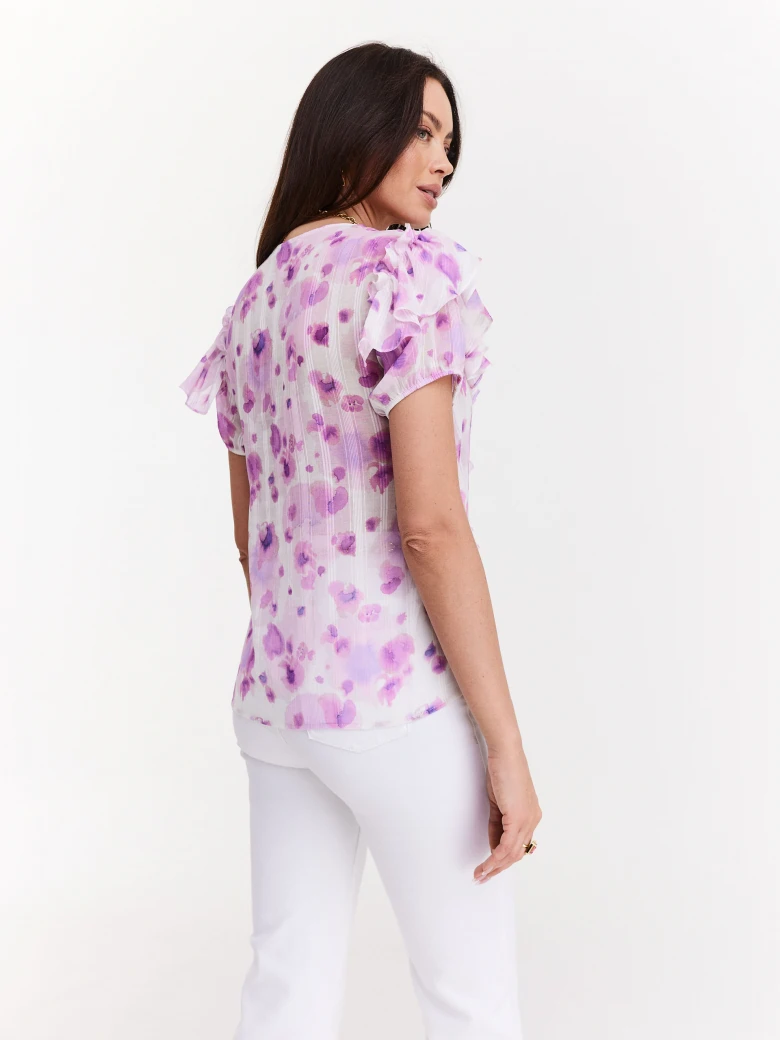 Airy blouse with jabot in purple flowers
