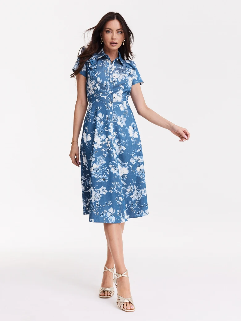 Blue emery type dress with white floral pattern