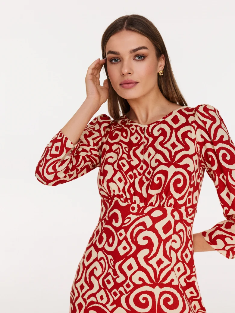 Red and cream dress