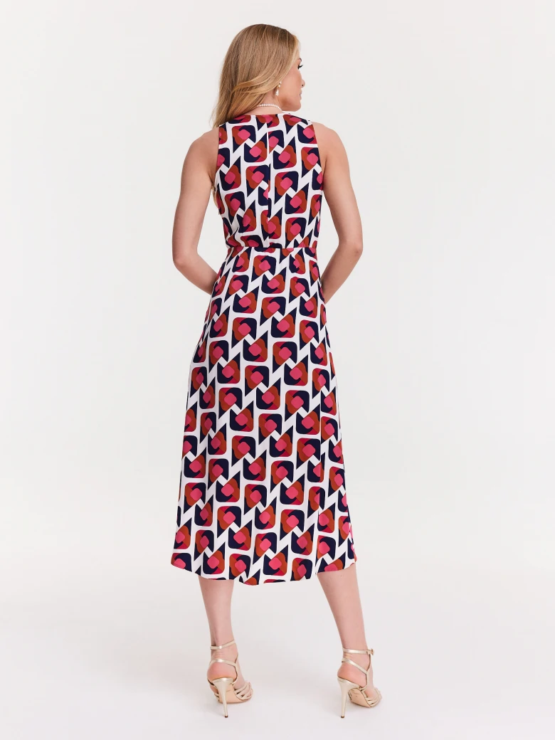 White dress with red and black patterns