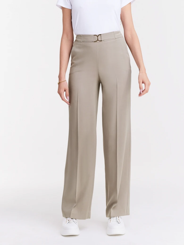 Beige pants with wide legs