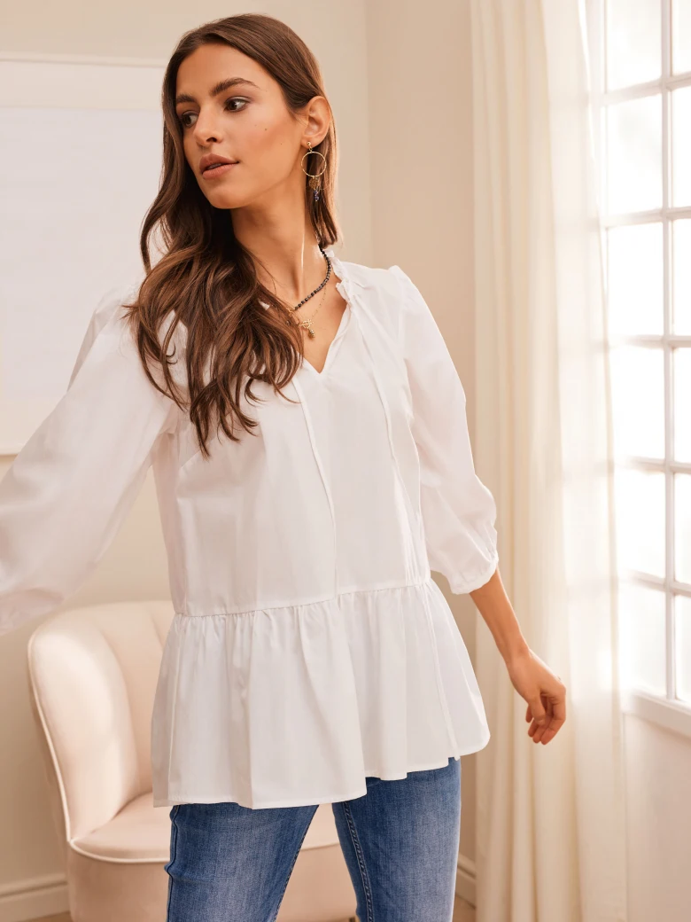 LOOSE WHITE BLOUSE WITH STITCHING AT THE WAIST