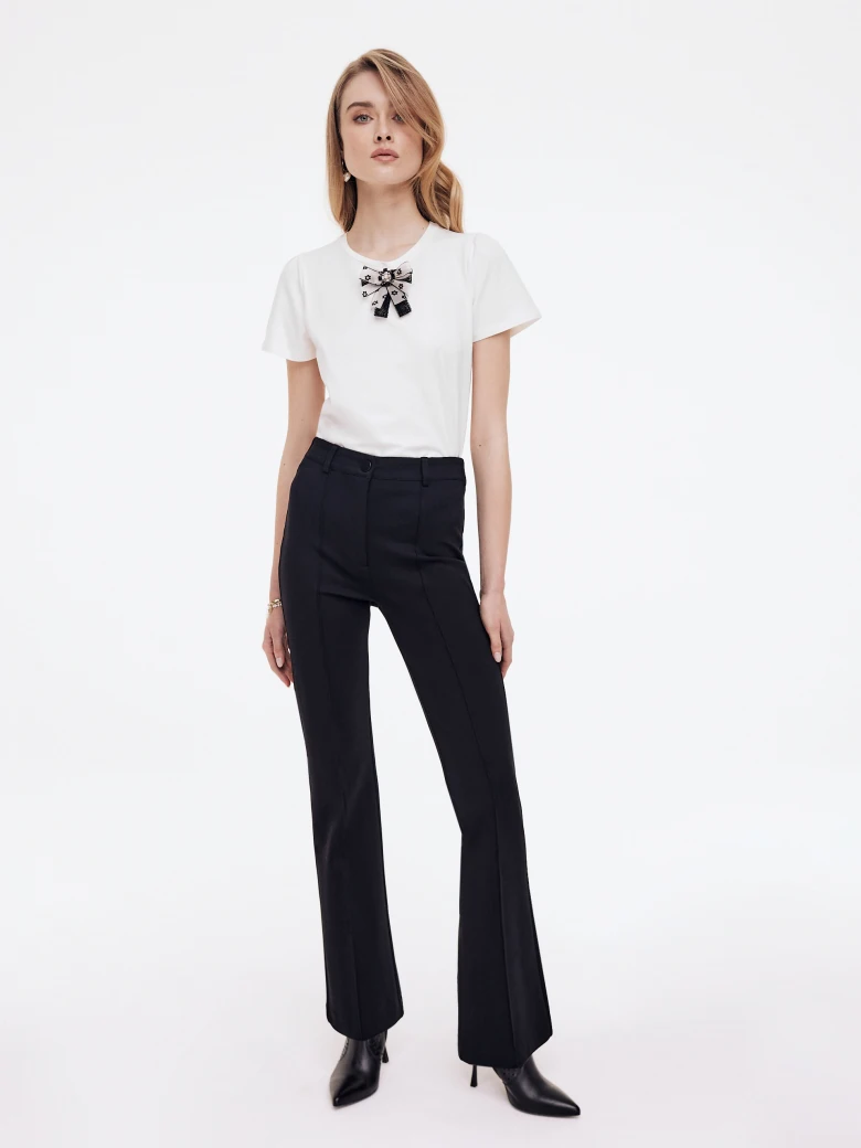 White blouse with bow and short sleeves